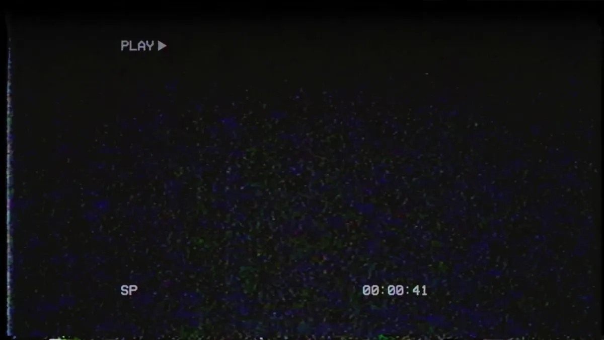 Blank VHS Tape with Play Overlay